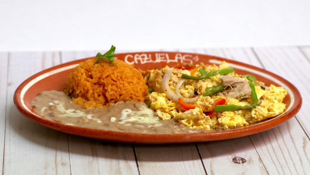 44. Machaca Chicken · Served with rice, beans and tortillas corn or flour.