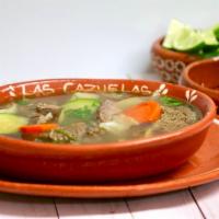 Cocido Soup · Beef soup with vegetables served with corn or flour tortillas