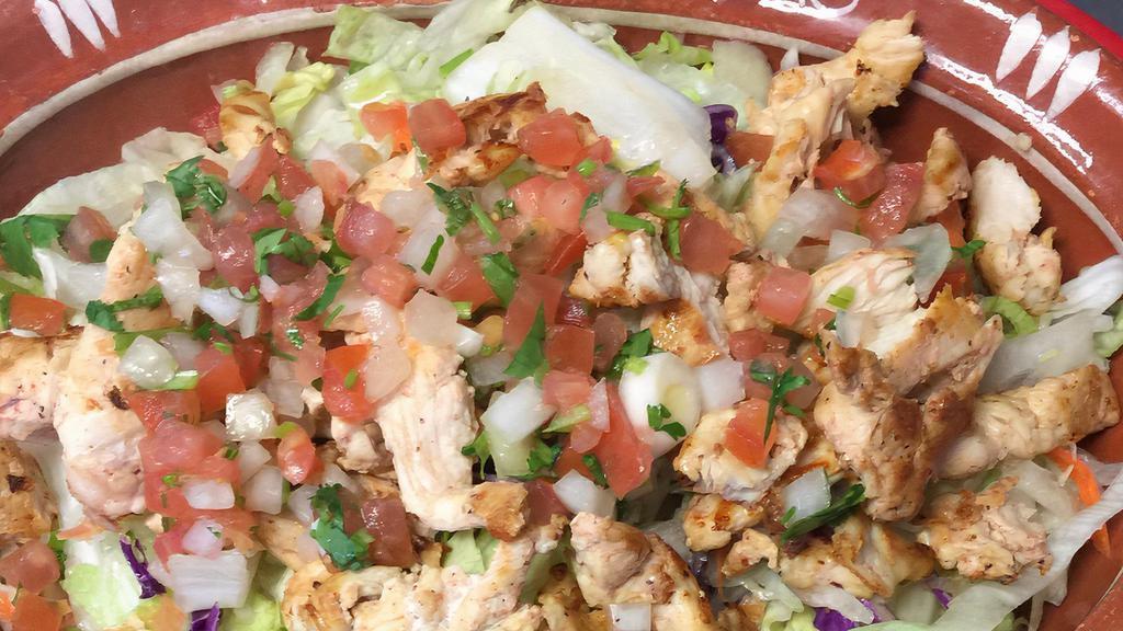 Burrito Bowl · Rice, beans, lettuce, cheese, sour cream and guacamole.
Prepared with choice of meat.
Chicken, Carnitas, Pastor, Steak, Chile Verde, Barbacoa, Veggie or Vegan.