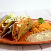 2. Two Crispy Tacos Platter · Chicken or Ground Beef crispy taco with lettuce and cheese, served with a side of rice and b...