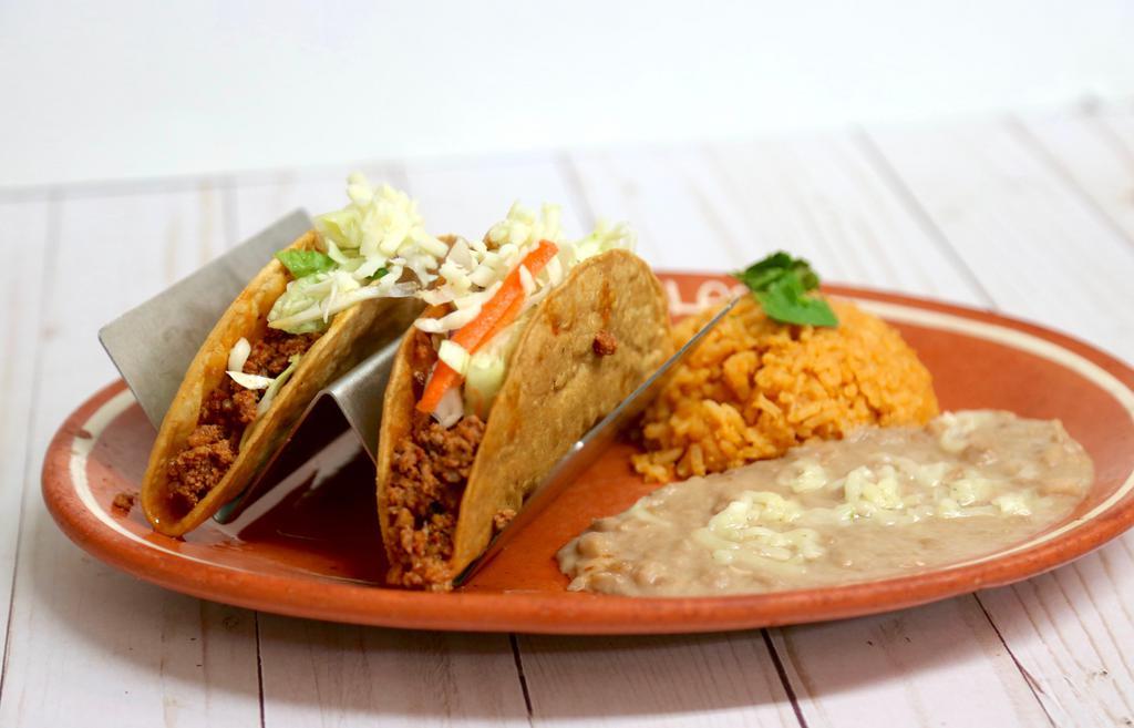 2. Two Crispy Tacos Platter · Chicken or Ground Beef crispy taco with lettuce and cheese, served with a side of rice and beans.