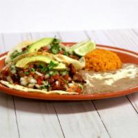4. Two Soft Tacos Platter · Corn tortilla,  choice of meat (chicken, steak or carnitas) topped with avocado and pico de ...
