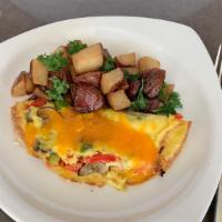 Build Your Own Omelet · Choose 3 items: chicken sausage, pork sausage, roasted mushrooms, caramelized onions, oven d...