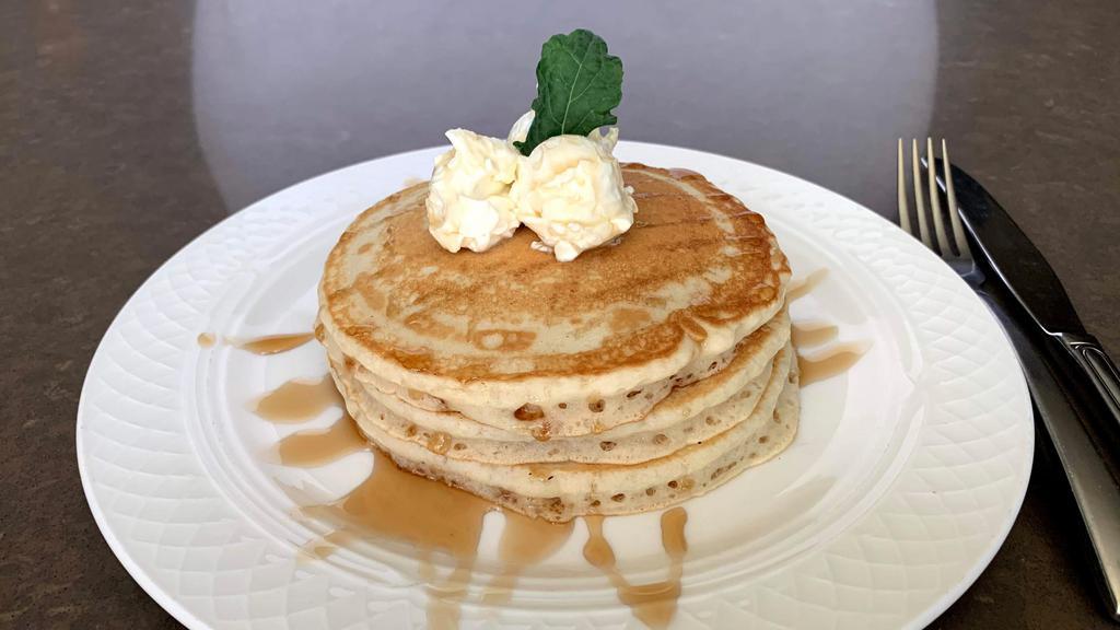Stack of Pancakes · Buttermilk pancakes, bacon infused maple syrup, whipped butter