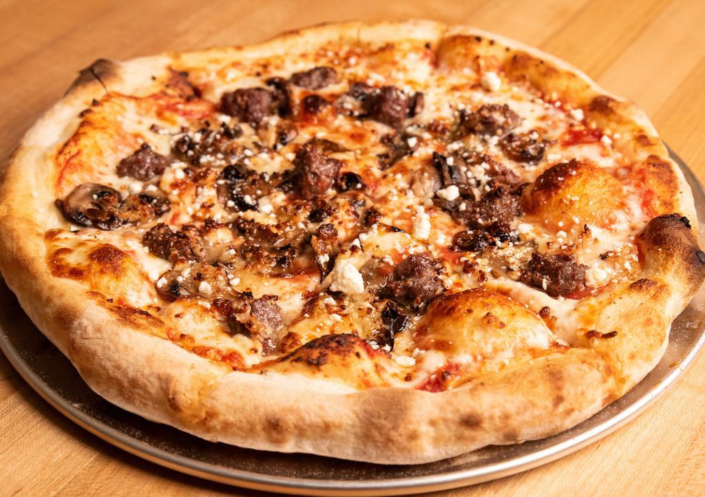 Sausage & Shrooms Pizza · House-made halal beef sausage, mushroom, garlic and Parmesan with tomato sauce.