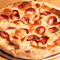 Island Boys Pizza · Halal beef pepperoni, pineapple and Parmesan with tomato sauce.