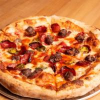 Spicy One Pizza · Halal beef pepperoni, house-made halal beef sausage, house pickled jalapeños and tapatio wit...