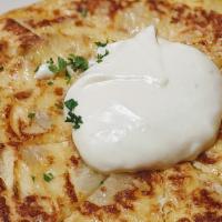 Tortilla de Patata
 · One of the most popular Spanish tapas; potato and onion omelet.