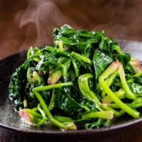 Stir Fried Spinach with Garlic · Stir fried spinach made to perfection with garlic.