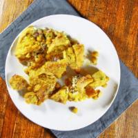 Chaat Samosa · Crispy patience stuffed with potatoes, peas mixed with special blend of spices and garbanzo ...