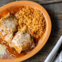 Shredded Chicken Burrito · Boneless chicken, sautéed in a light tomato flavored sauce, bell peppers, tomatoes, and onio...