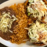 Sope  Platillo  (2 sopes) · 2 sopes, your choice of meat, with refried beans, lettuce, sour cream, cheese, onions and to...
