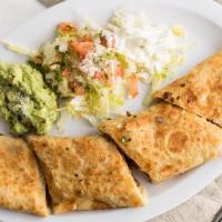 Quesadilla Suiza · Your choice of meat, toasted with jalapeño butter with sour cream, guacamole  and pico de ga...