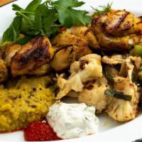 Chicken Plate · One kebab (pieces of grilled Mary's organic chicken leg marinated in turmeric, fenugreek, fe...