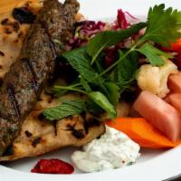 Lamb Plate · One grilled lamb kebab (ground organic lamb with lovage, mint, parsley, cardamom, and cumin)...