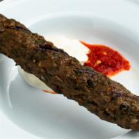 Single Lamb Kebab · One grilled kebab:  ground organic lamb with lovage, mint, parsley, cardamom, and cumin. Ser...