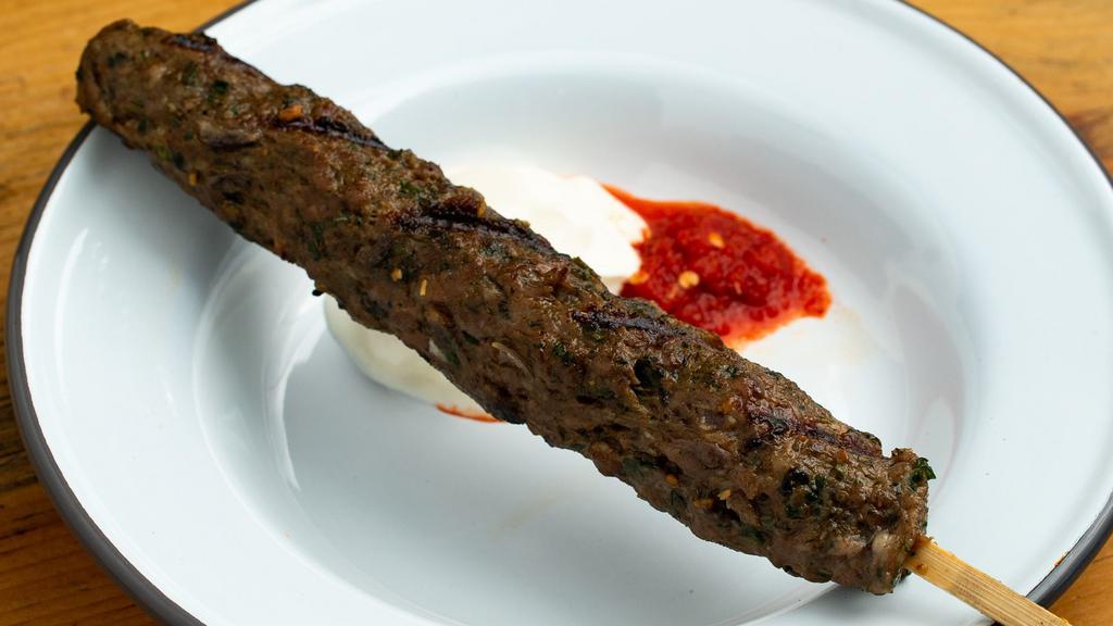 Single Lamb Kebab · One grilled kebab:  ground organic lamb with lovage, mint, parsley, cardamom, and cumin. Served with yogurt and spicy pickled chiles. ￼.