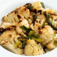 Roasted Cauliflower Salad · Roasted cauliflower with grilled scallions and preserved lemon.  Vegan