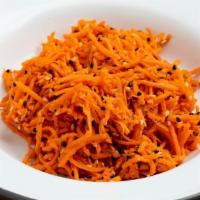 Carrot Salad · Vegan. Shredded carrots with sesame seeds, caraway and lime.