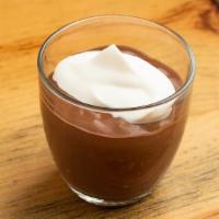 Chocolate Pudding · Homemade chocolate pudding with whipped cream. 
 Vegetarian.