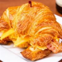 Breakfast Croissant · Eggs, cheese, choice of bacon, ham, or sausage.