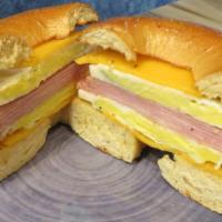 Breakfast Bagel · Eggs, cheese, choice of bacon, ham, or sausage.
