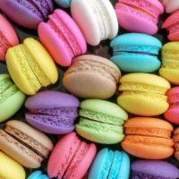 Macarons · delicious assortment of vanilla, salted caramel chocolate passion fruit, raspberry coffee ea...