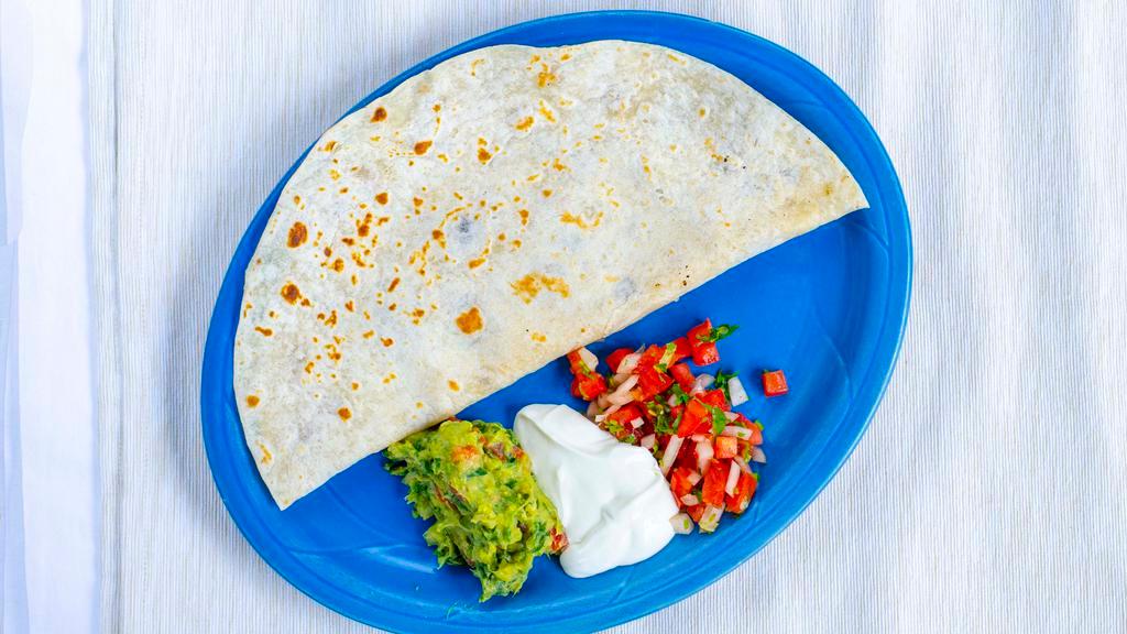 Prawn Quesadilla · A large tortilla grilled and filled with melted cheese, sautéed prawns, onions and bell peppers. Served with our sour cream.