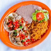 Soft Taco Plate · Two soft corn tortillas stuffed with your choice of meat and pico de gallo. Served with rice...