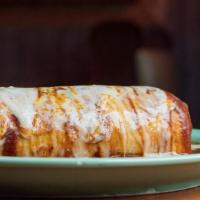 Regular Burrito Mojado · An El Charro favorite. A large flour tortilla stuffed with your choice of meat, rice, beans ...