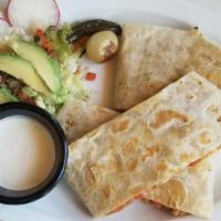Quesadilla Regular · With your choice of meat and a side of sour cream.
