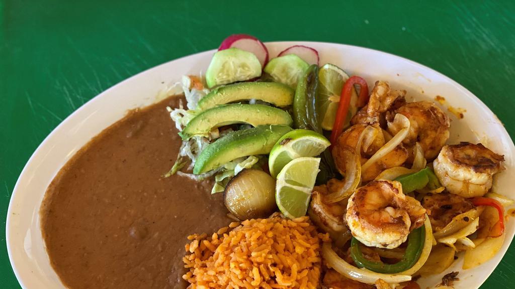 Orden de Fajitas Camaron  · Grilled prawns, bell pepper and onion. With a side of rice, beans, and tortillas.