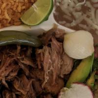 Plato de Carnitas · Pulled pork plate with a side of rice, beans, avocado and tortillas.