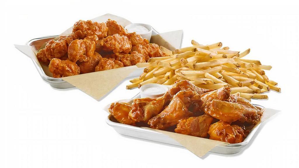 20 Boneless + 20 Traditional Wings & Fries · 20 TRADITIONAL WINGS AND 20 BONELESS WINGS HANDSPUN IN YOUR FAVORITE SAUCE OR DRY SEASONING. SERVED WITH FRENCH FRIES.
