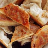 Potstickers · Fried Dumplings Filled with Pork and Vegetables with Sweet Chili Sauce
