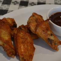 BBQ Wings · 6 piece BBQ dry rubbed wings served with BBQ dipping sauce.