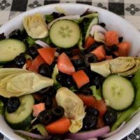 Garden · Mixed greens, red onions, cucumbers, artichoke hearts, roma tomatoes, black olives with choi...