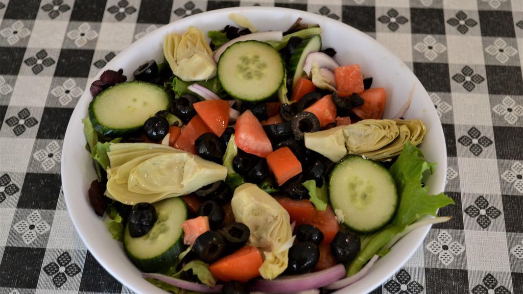 Garden · Mixed greens, red onions, cucumbers, artichoke hearts, roma tomatoes, black olives with choice of dressing