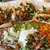 3 Tacos Plate · 3 Tacos with the meat of your choice served with rice and beans. Sour cream, Guacamole, and ...