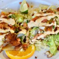 Tacos de Pescado/Baja Fish Tacos (EACH) · (Pescado) lightly battered fish, shredded lettuce, pico de gallo & a special & spicy tartar ...