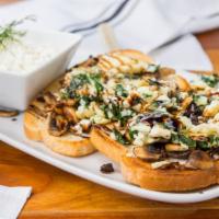 Mushroom Toast  · served on sliced sourdough with whipped Mascapone and goat cheese, sauteed spinach, eggwhite...