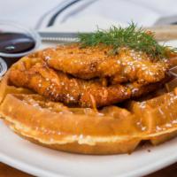 Chicken N Waffle · House fried chicken over a crispy Belgium waffle, Castro's sauce, dusted with powdered sugar...