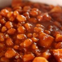 Baked Beans · Baked beans cooked in a sweet BBQ sauce.