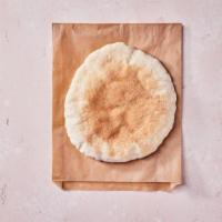 Pita Bread (VG) · Warm and fluffy. Contains gluten. We cannot make substitutions.