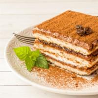Tiramisu · Delicate lady fingers dipped in coffee, layered with a creamy mascarpone filling and a hint ...