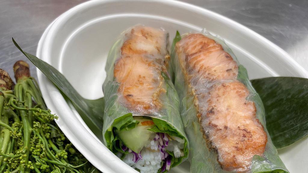 Spring Rolls with Tamarind Sauce · Bean sprouts, assorted mints, the bitter but highly beneficial neem flowers (optional), rice noodles, rolled in rice paper. Served with Angkor Tamarind Sauce. Contains fish.
