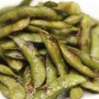 Grilled Garlic Edamame · Lightly salted boiled green soy beans with grilled garlic.