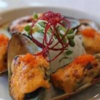 Baked Mussels · Baked mussels with creamy sauce.
