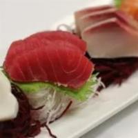 Sashimi Deluxe Lunch · 12 pcs of house selected sashimi. Served with  salad and rice.