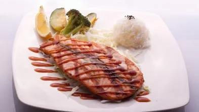 Salmon Teriyaki lunch · Charbroiled fillet of salmon in teriyaki sauce. Served with salad and rice.